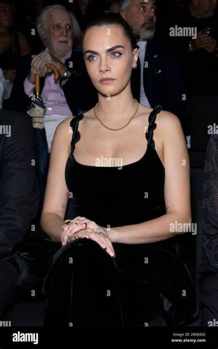 Cara Delevingne attends the Emporio Armani fashion show during the Milan Fashion Week Womenswear Spring/Summer 2024 on September 21, 2023 in Milan,...