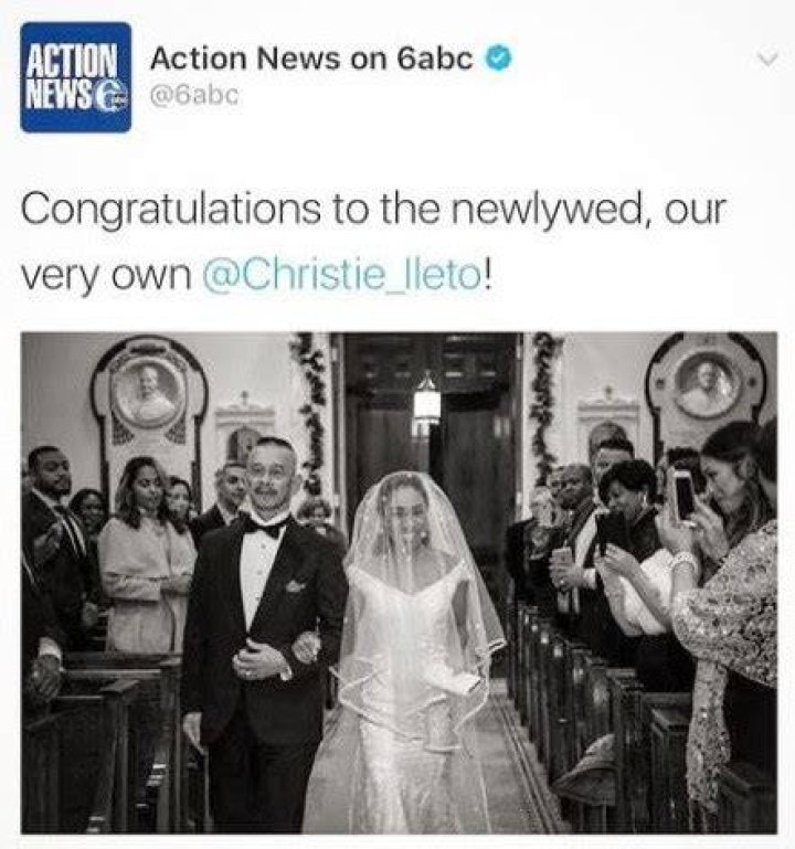 Christie Ileto walking down the aisle hand in hand on the wedding. She is wearing a white gown