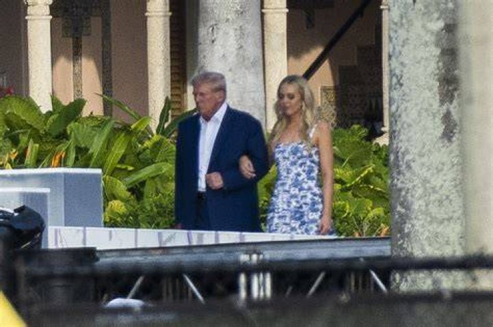 Donald Trump walks daughter Tiffany down aisle at lavish MaraLago