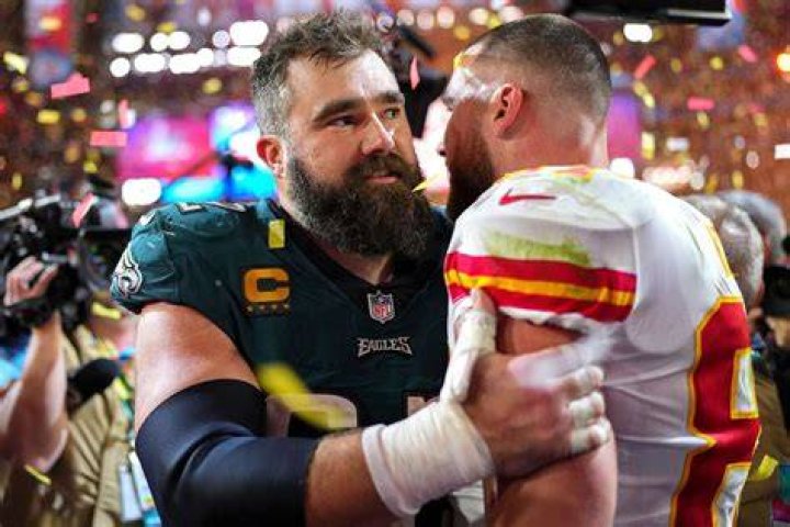 Jason and Travis Kelce pose for a photo during Game 1 of the NLCS between the Arizona Diamondbacks and the Philadelphia Phillies at Citizens Bank P...