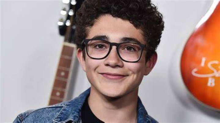 Picture of Nicolas Bechtel by wearing a black hoodie.