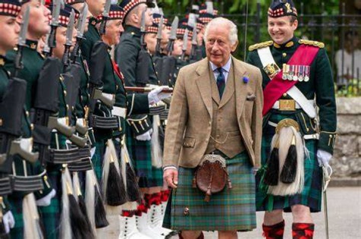 Prince Charles In Kilt And Sporran And Shepherd's Crook Walking Stick With Prince William & Prince Harry At Polvier, By The River Dee, Balmoral...