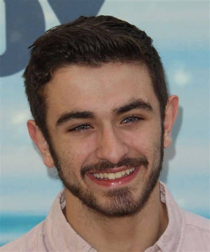 Ricky Ubeda wearing white shirt