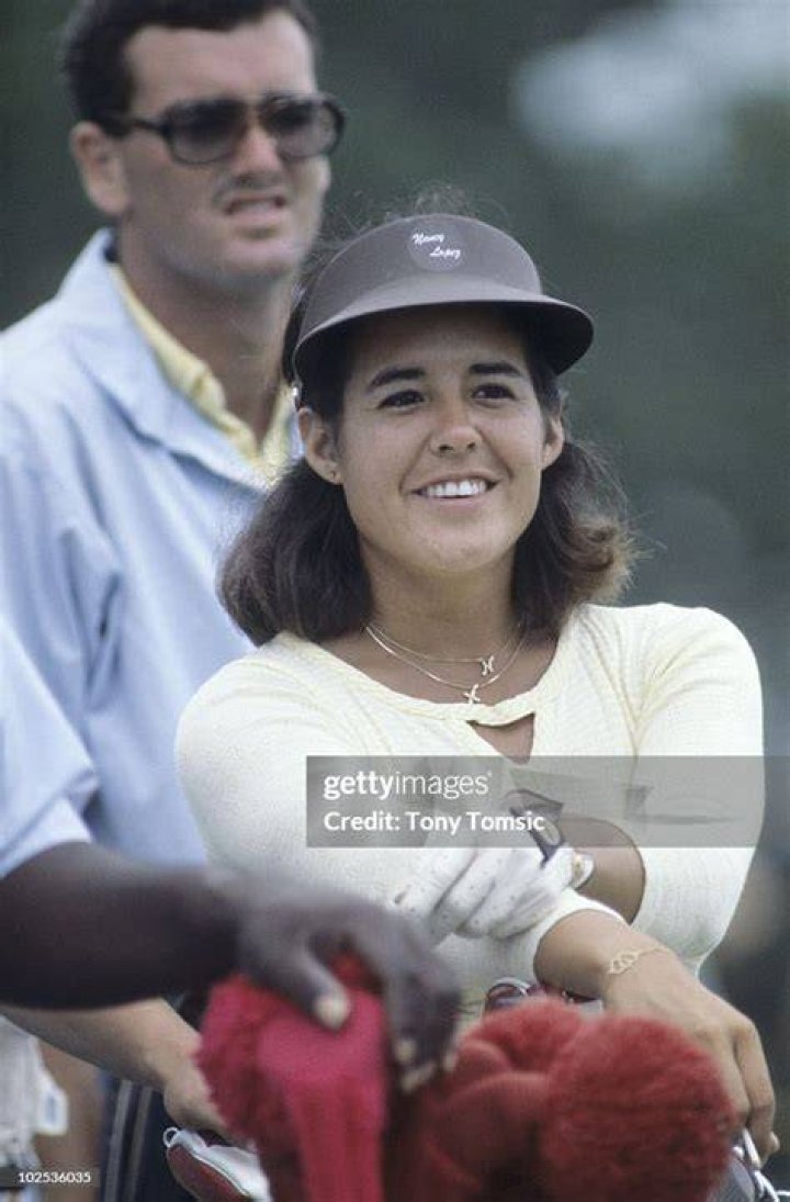 Want to know about Golfing Legend Nancy Lopez’s personal life?? Source: Getty Images (Nancy Lopez and her husband Tim Melton)
