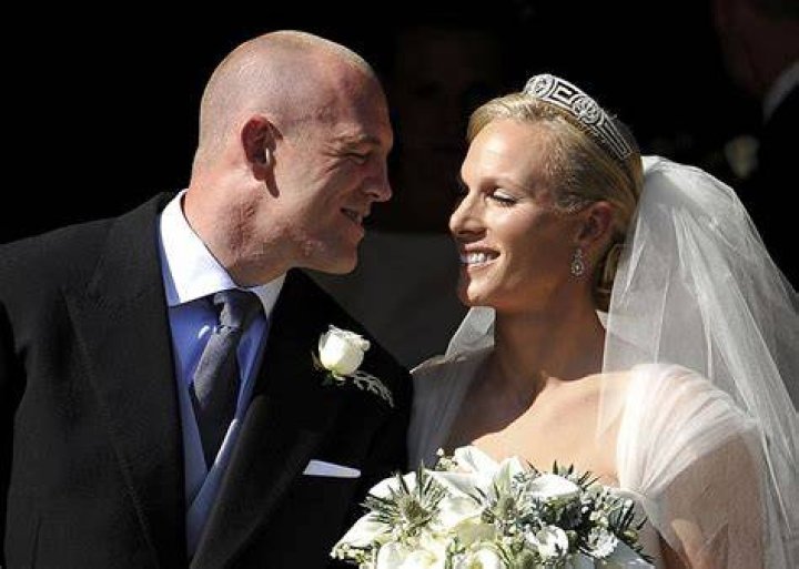 Zara and Mike Tindall leave with Britain's Queen Elizabeth after they attended the Patron's Lunch on the Mall, an event to mark the queen's 90th birthday, in London